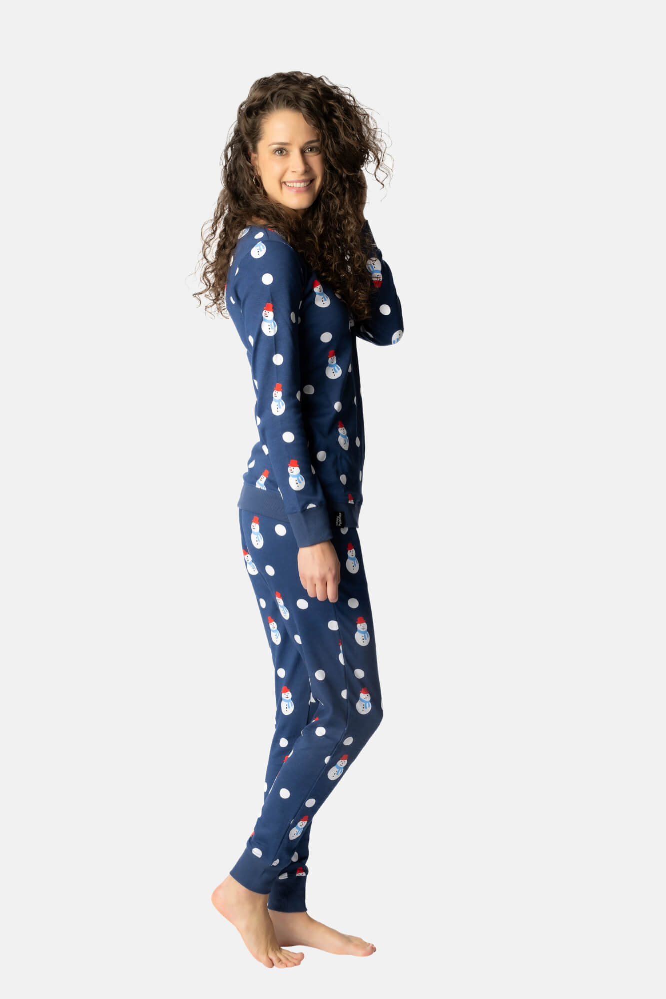 Zijkant - winter pyjama - donkerblauw - sneeuwpoppen met dots